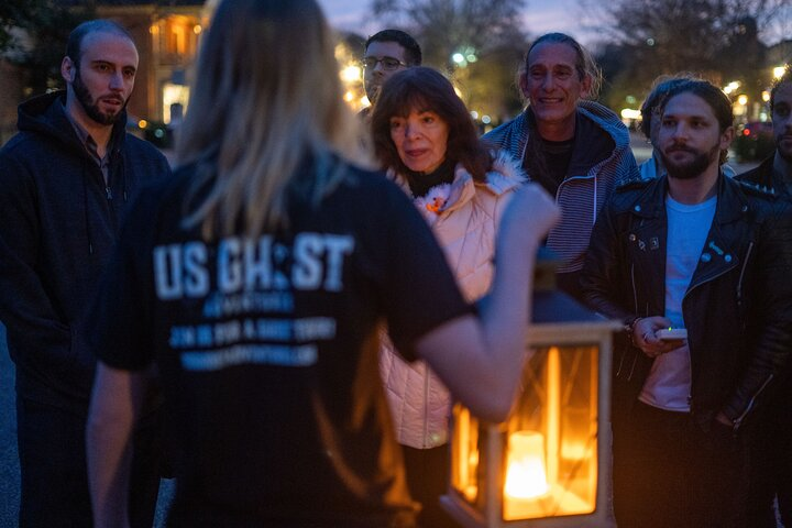 Guests enjoying a thrilling tale in the chilly OBX night. 